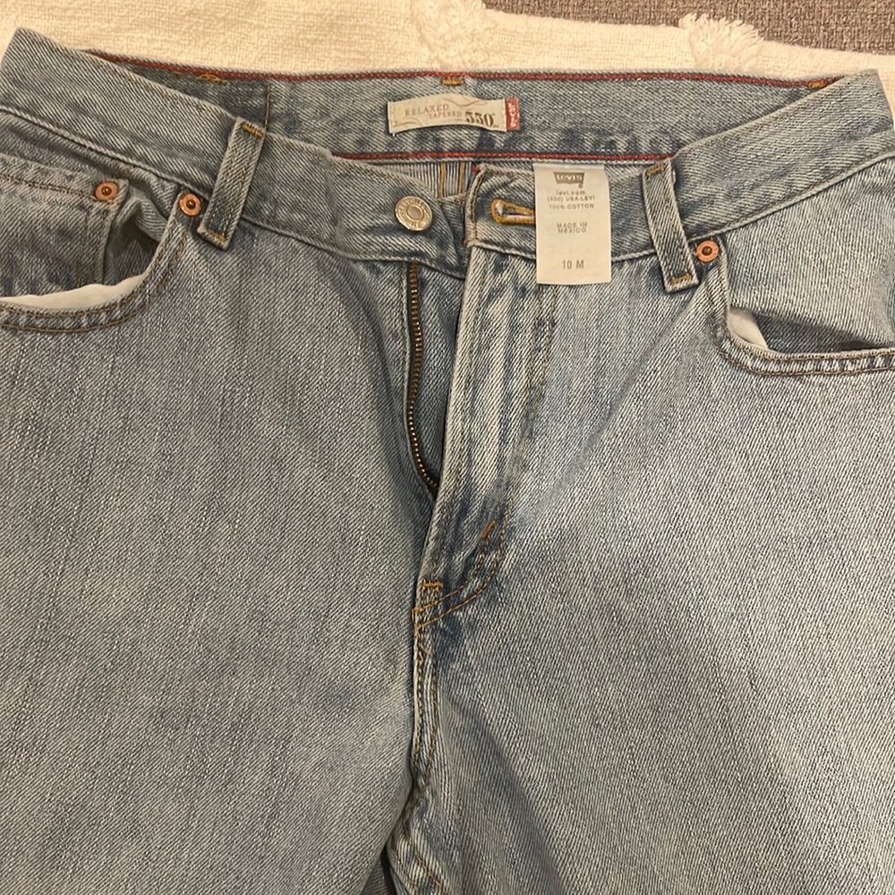 550 LEVI, relaxed tapered fit SIZE 10